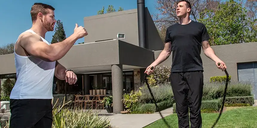 At-home personal trainer leading a cardio session