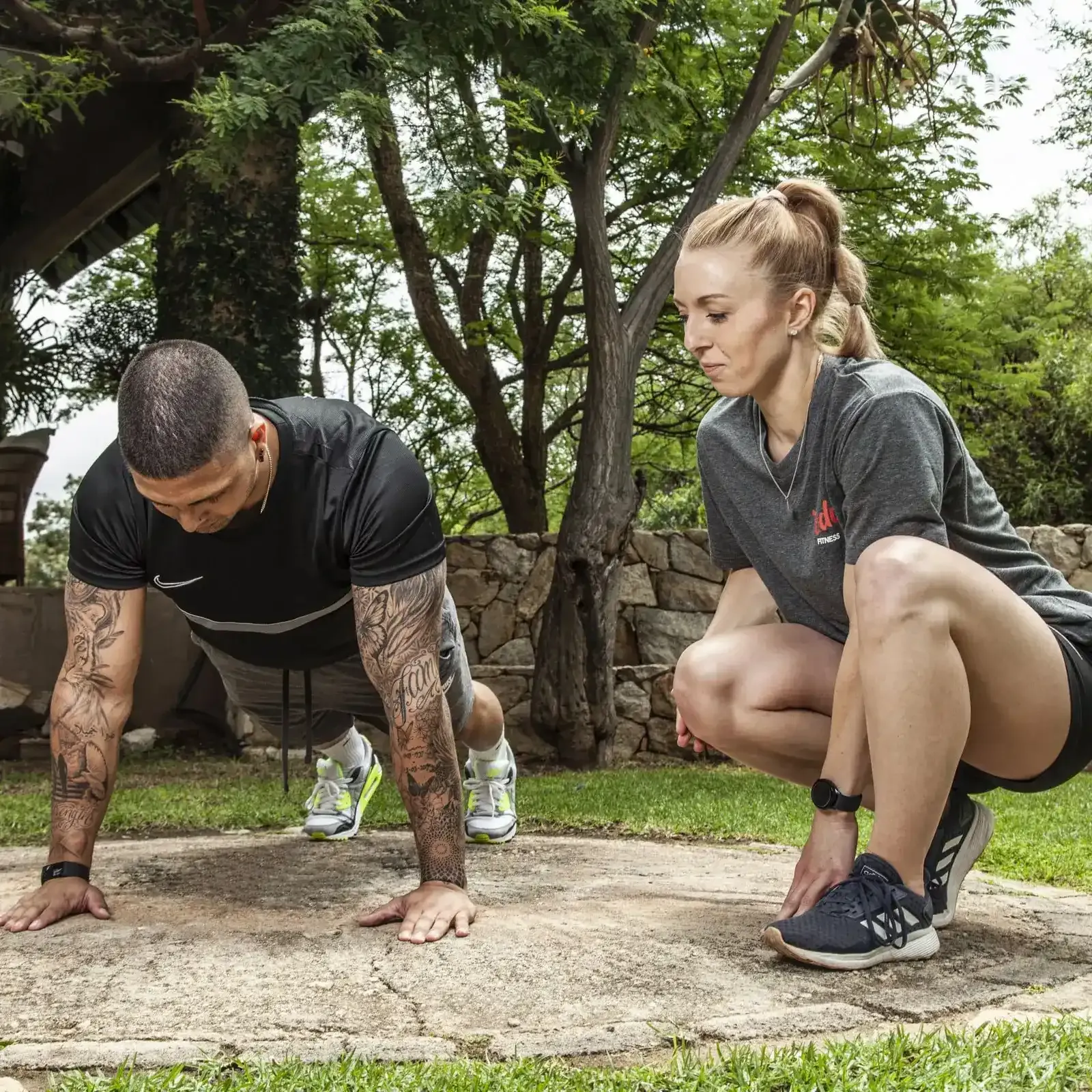At-home personal trainer coaching a client in Cape Town